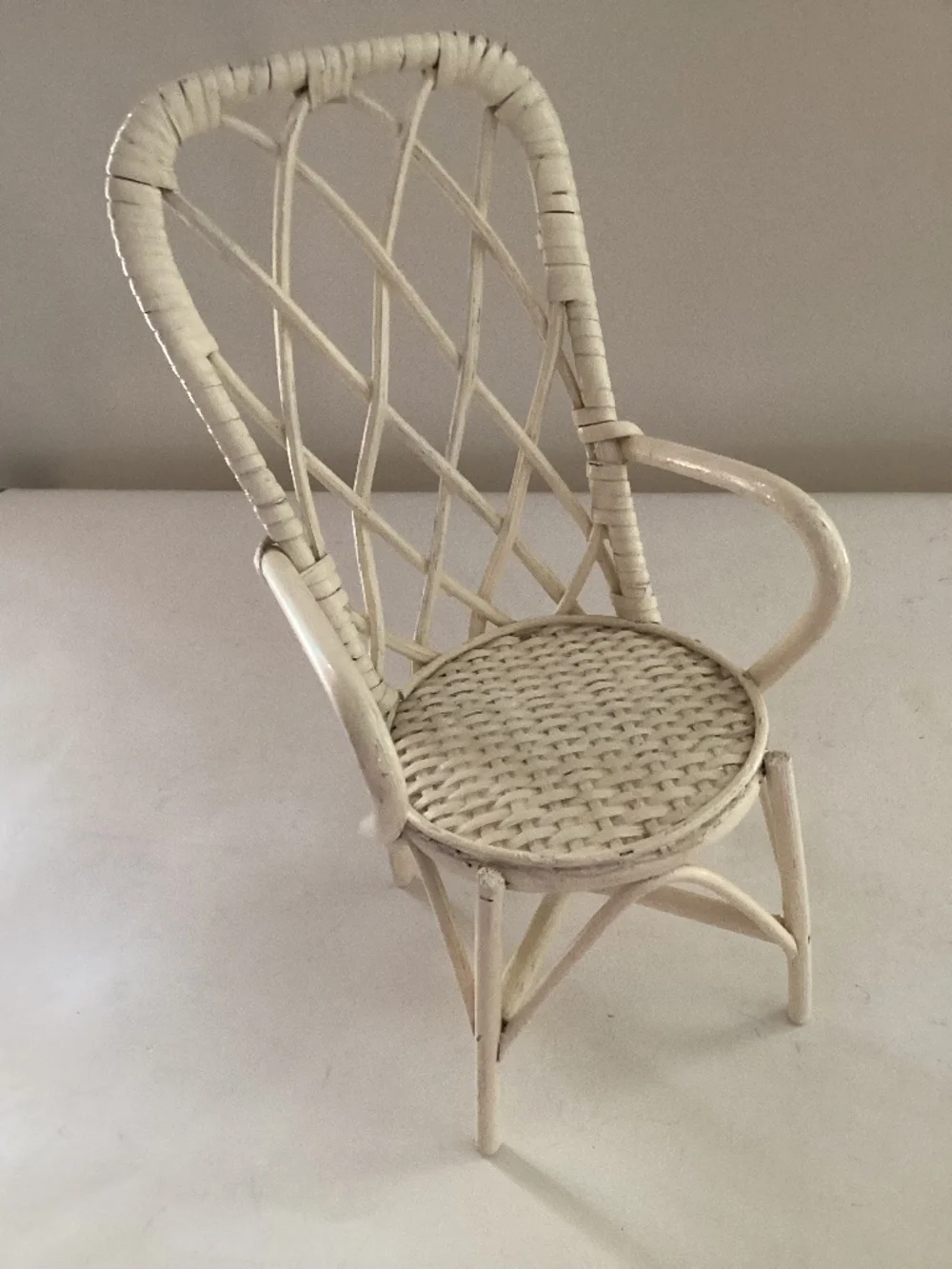 Mini off-white wicker chair for decor or doll/stuffed animal display